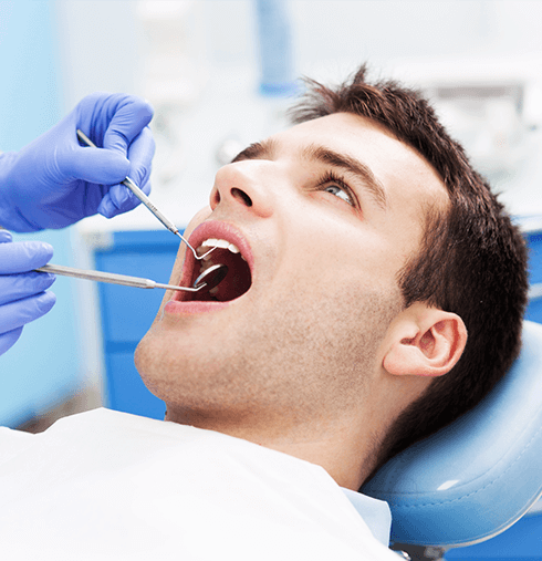 man at the dentist