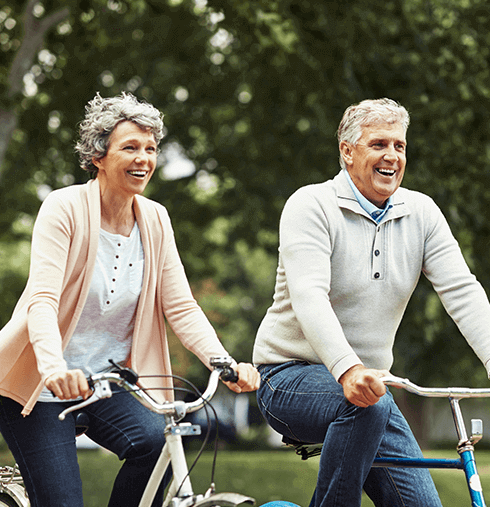 senior couple riding bikes