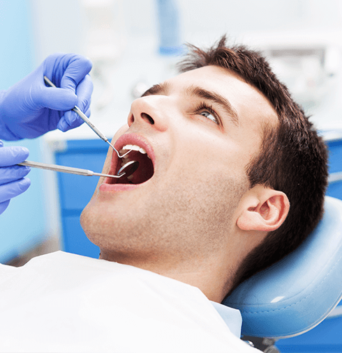 man receiving dental work