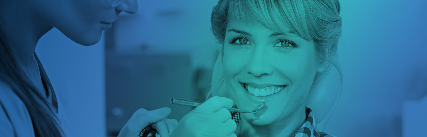 woman smiling during her dental cleaning