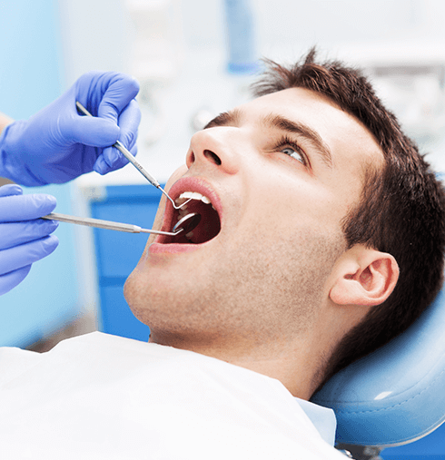 man at the dentist