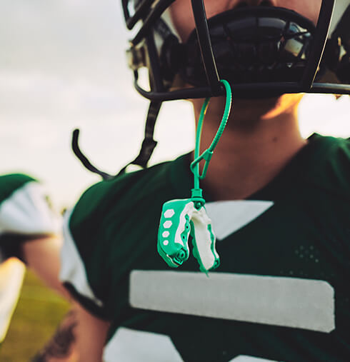 closeup of a football player's mouthguard