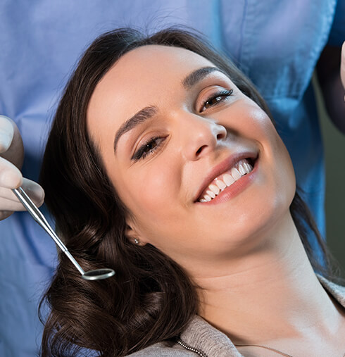 smiling woman at the dentist