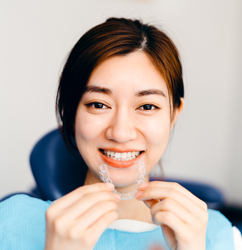 woman with invisalign